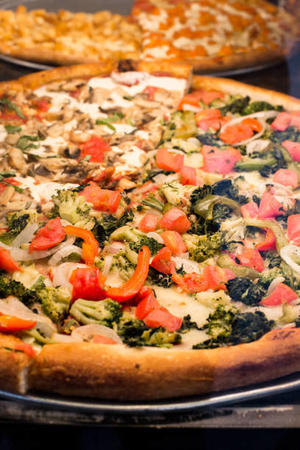 What Are the Key Elements of New York Style Pizza Making? - 