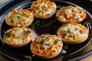 How do you make Mini Bagel Pizzas with a twist? - 