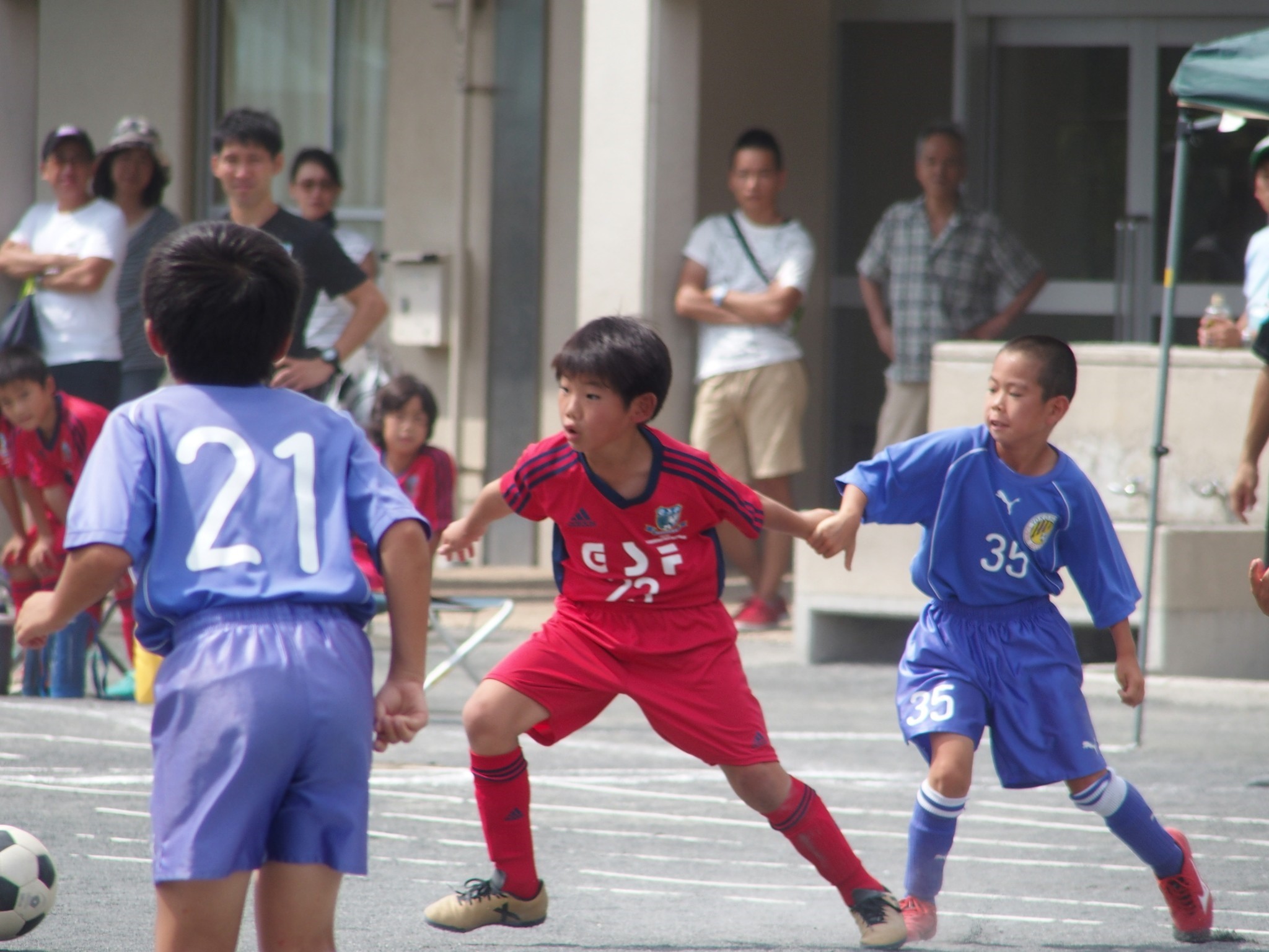 4年生　国際チビッ子サッカー大会　予選リーグ1日目_a0109316_19434003.jpg