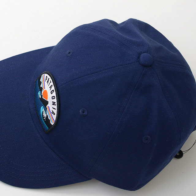 boardie badge trad cap